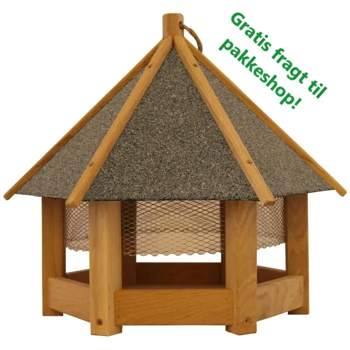 Fuglefoderhus med net. Udført i FSC certificeret egetræ med tag i grå tagpap. ø44 cm.
